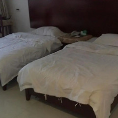 Апартаменты Yefeng Hai Holiday Apartment Jinling Sea View комната для гостей