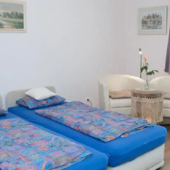 Апартаменты Deluxe Apartments комната для гостей фото 3