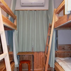Отель Guesthouse Yakushima 2* Кровать в мужском общем номере фото 4