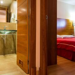 Отель Astuy Apartamentos Арнуэро спа