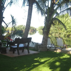 Отель CoCo Riverside Homestay Хойан фото 4