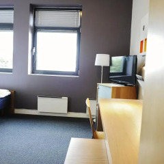 Отель Smarthotel Forus сейф в номере