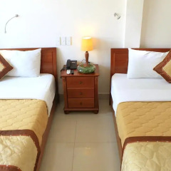 Giang Son 2 Hotel 2* Стандартный семейный номер с двуспальной кроватью фото 6