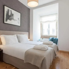 Отель Feels Like Home Rossio Prime Suites 4* Стандартный номер с 2 отдельными кроватями (общая ванная комната) фото 22
