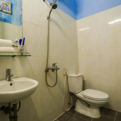 Отель Nhu Huy Homestay Стандартный номер с различными типами кроватей фото 3