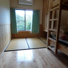 Отель Guesthouse Yakushima Якусима комната для гостей фото 2