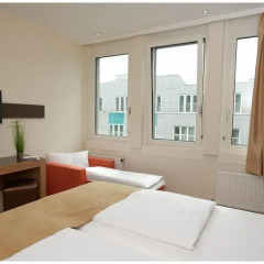 Отель Motel Plus Berlin 3* Стандартный семейный номер с двуспальной кроватью фото 5
