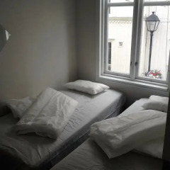 Отель Grimstad Hostel & Vandrehjem Норвегия, Гримстад - отзывы, цены и фото номеров - забронировать отель Grimstad Hostel & Vandrehjem онлайн комната для гостей фото 2