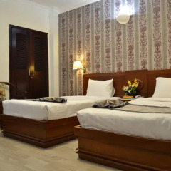 Отель COMMON INN Ben Thanh 2* Улучшенный номер с 2 отдельными кроватями фото 3