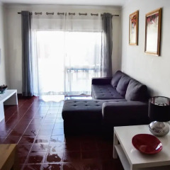 Отель Alveiros Apartamentos Praia dos Aveiros комната для гостей
