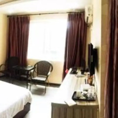Отель Mianyang Triumph Business Inn в номере