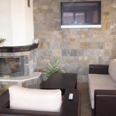 Апартаменты Tzanev Apartments - Bansko Банско комната для гостей фото 2
