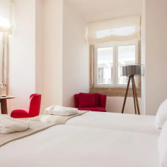 Отель Feels Like Home Rossio Prime Suites 4* Стандартный номер с 2 отдельными кроватями (общая ванная комната) фото 25
