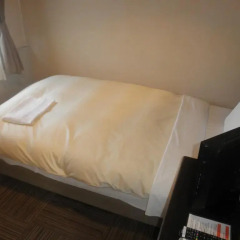 Отель Hospitality In Yawatajuku Камагая комната для гостей