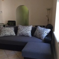 Апартаменты Boutique Apartment B.I.G. комната для гостей