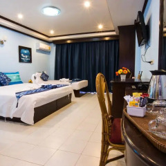 Отель The Grand Orchid Inn 2* Семейный номер Делюкс разные типы кроватей фото 10