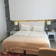 Отель Metropolitan Suites 4* Номер Делюкс фото 5