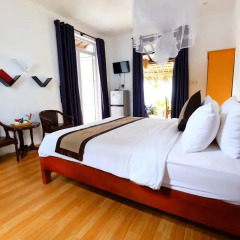 Отель An Bang Sunrise Beach Bungalow сейф в номере