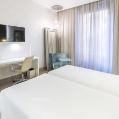 Отель NH Milano Touring 4* Улучшенный номер с различными типами кроватей фото 29