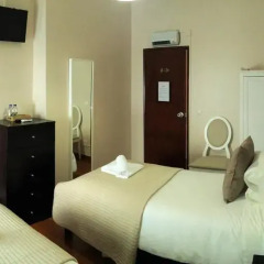 Отель The Capital Boutique B&B удобства в номере