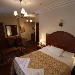 Апартаменты Tashkonak Sultan Suites and Apartments Люкс с различными типами кроватей фото 13