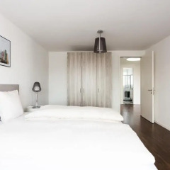 Апартаменты Ema House Serviced Apartments Seefeld Цюрих комната для гостей