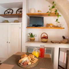 Отель Grandi Trulli Bed & Breakfast Альберобелло в номере
