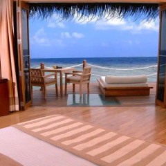 Отель Adaaran Prestige Water Villas Медупару комната для гостей