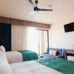 Отель Isla Natura Beach Huatulco 5* Стандартный номер с различными типами кроватей фото 2
