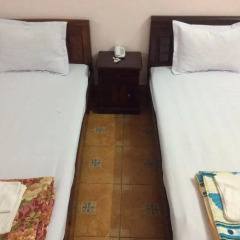 Отель My Hoa Guest House Стандартный номер с различными типами кроватей фото 5