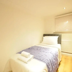Отель OYO Home Kings Cross St Pancras Garden комната для гостей