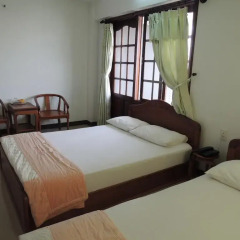 Minh Cat Hotel 2* Стандартный семейный номер с двуспальной кроватью фото 2
