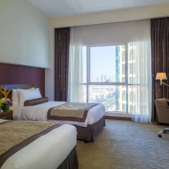 Отель Grand Millennium Al Wahda 5* Улучшенный номер с различными типами кроватей фото 5