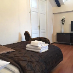 Отель Cozy Mansard in the Heart of Old Riga Латвия, Рига - отзывы, цены и фото номеров - забронировать отель Cozy Mansard in the Heart of Old Riga онлайн комната для гостей фото 2