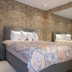 Апартаменты Luxury Living Apartments комната для гостей фото 2