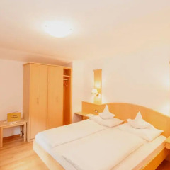 Отель Appartements Kirchtalhof Лана комната для гостей