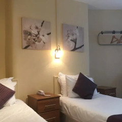 George Hotel 3* Стандартный номер с 2 отдельными кроватями (общая ванная комната) фото 8