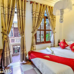 Отель Nhi Nhi 3* Номер Делюкс фото 13