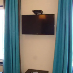 Отель Apartamentos Kósmos сейф в номере