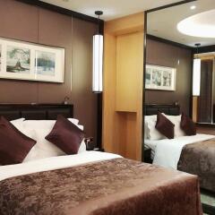Отель Zhongshan Tegao Business Hotel Китай, Чжуншань - отзывы, цены и фото номеров - забронировать отель Zhongshan Tegao Business Hotel онлайн комната для гостей фото 2