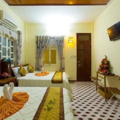 Отель Homestay Thanh Phuong 2 2* Улучшенный номер с различными типами кроватей фото 3