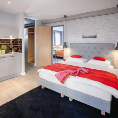 Апартаменты Mloft Apartments Munchen Мюнхен комната для гостей фото 4