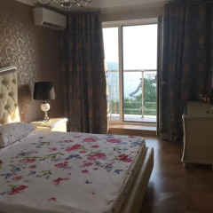 Апартаменты Apartment Chernomorskaya Сочи комната для гостей фото 3