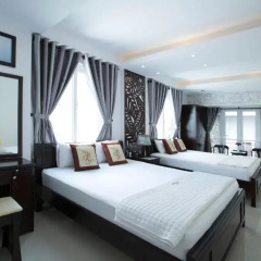 Отель Gia Vien Homestay 3* Стандартный семейный номер с двуспальной кроватью фото 5