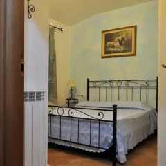 Отель La Casa Rosa Кастаньето-Кардуччи в номере