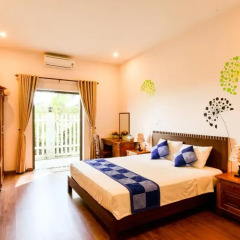 Отель Tra Que Riverside Homestay 2* Улучшенный номер с различными типами кроватей фото 3