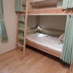 Отель Guesthouse Yakushima 2* Кровать в женском общем номере фото 2
