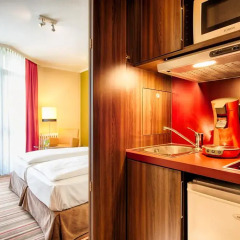 Отель Leonardo Hotel & Residenz München Германия, Мюнхен - 11 отзывов об отеле, цены и фото номеров - забронировать отель Leonardo Hotel & Residenz München онлайн удобства в номере