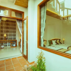 Отель Riverside Plum Garden Homestay 2* Улучшенный номер с различными типами кроватей фото 6