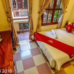 Отель Nhi Nhi 3* Номер Делюкс фото 6
